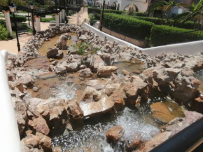 Bajo con Jardín en Thalassa